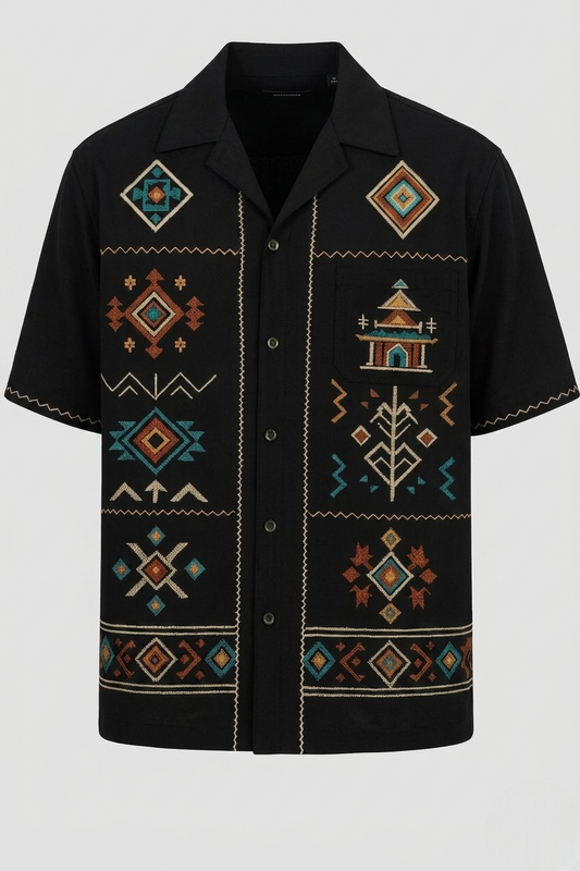 Black shirt with geometric and tribal patterns on a white background